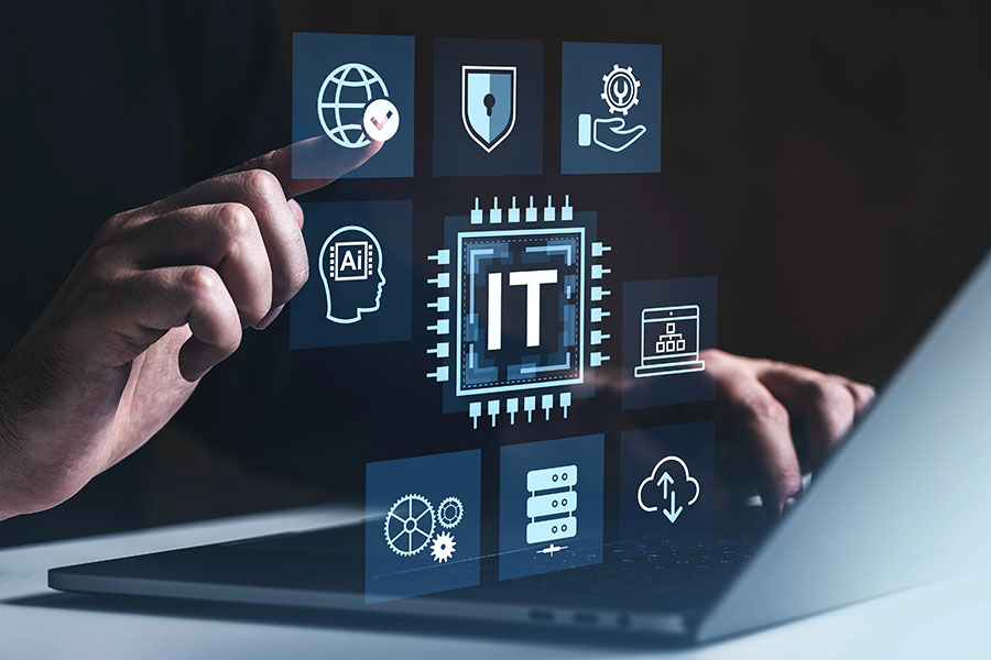 it-services-concept A hand is interacting with a digital interface displaying various IT-related icons, including a globe, security shield, artificial intelligence, and server imagery, in front of a laptop.