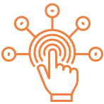 A woman in a gray suit sits at a computer desk, focused on multiple monitors displaying data and code in a dimly lit, tech-filled environment.